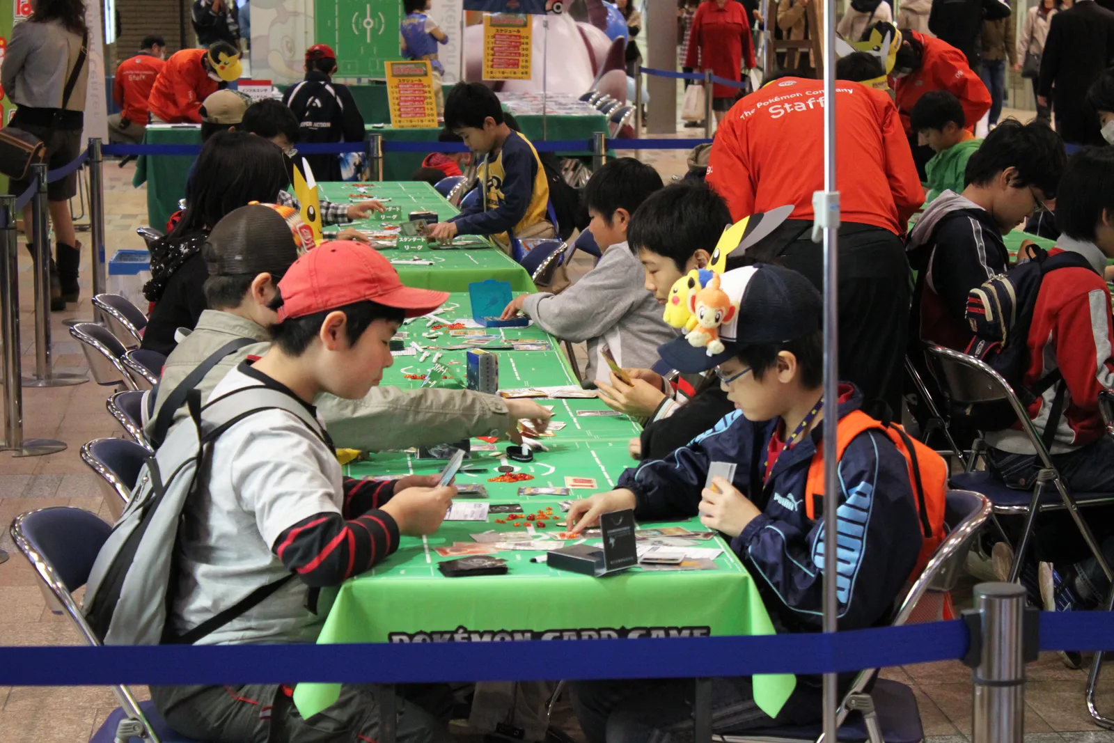 Pokemon Trading Card Game cards laid out mid-battle on a playmat during a game.